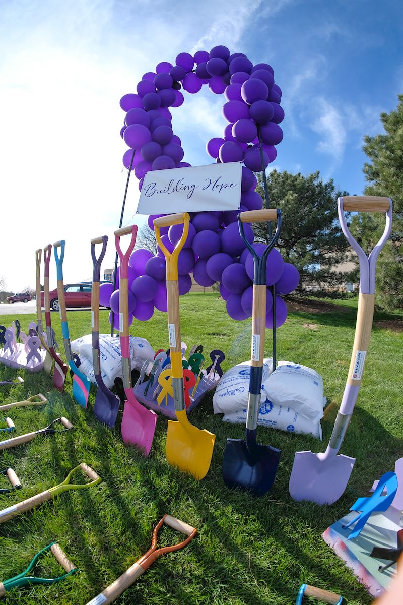 Cancer support ribbons and multi colored shovels